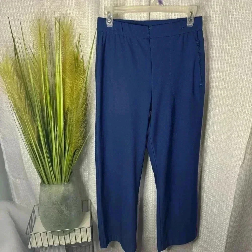 Nike Dri Fit Tract Pant Women Size Large Straight Leg Pocket Front Zip Closure